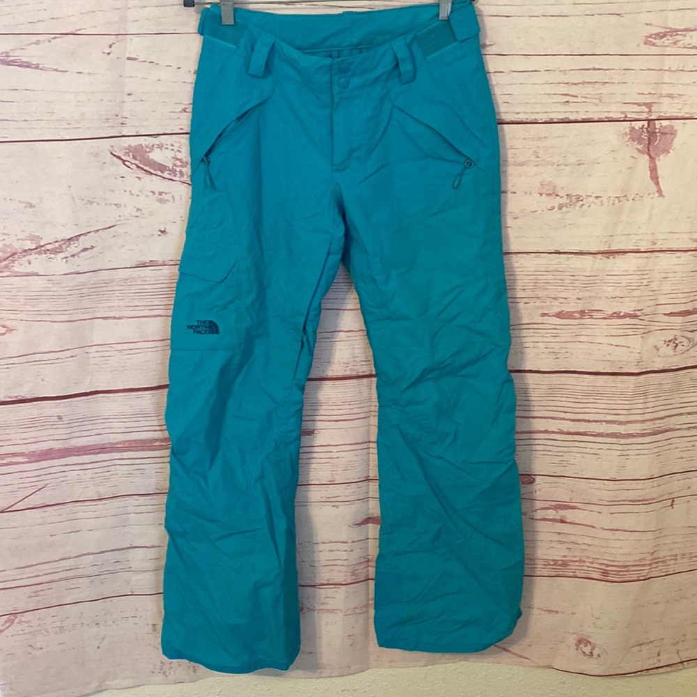 The North Face women’s teal Hyvent snow pants